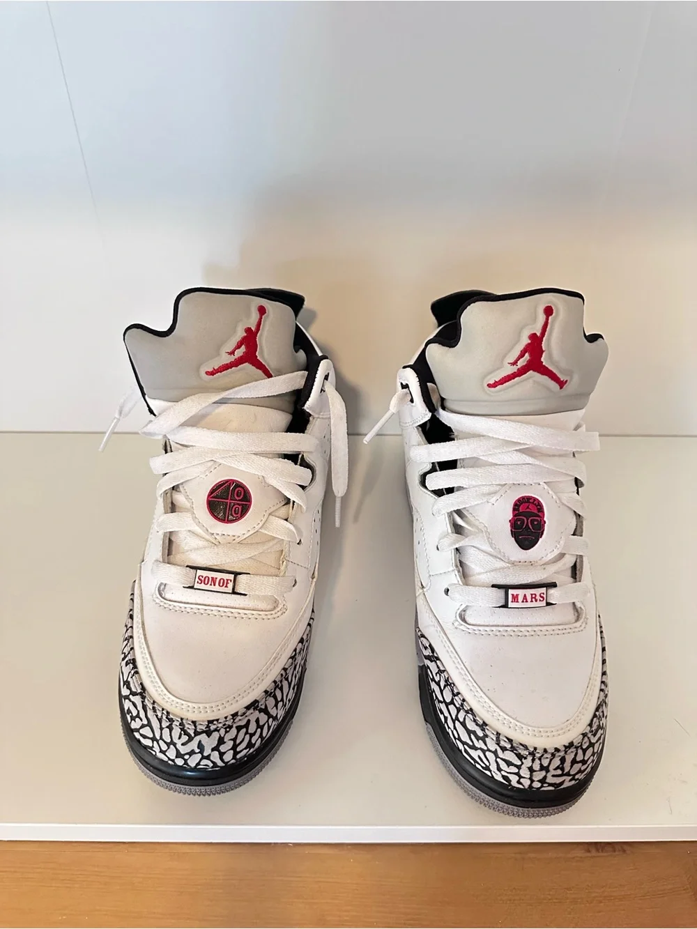Jordan Son of Mars Low Basketball Sneakers in White, Black and Red Boy 4.5Y